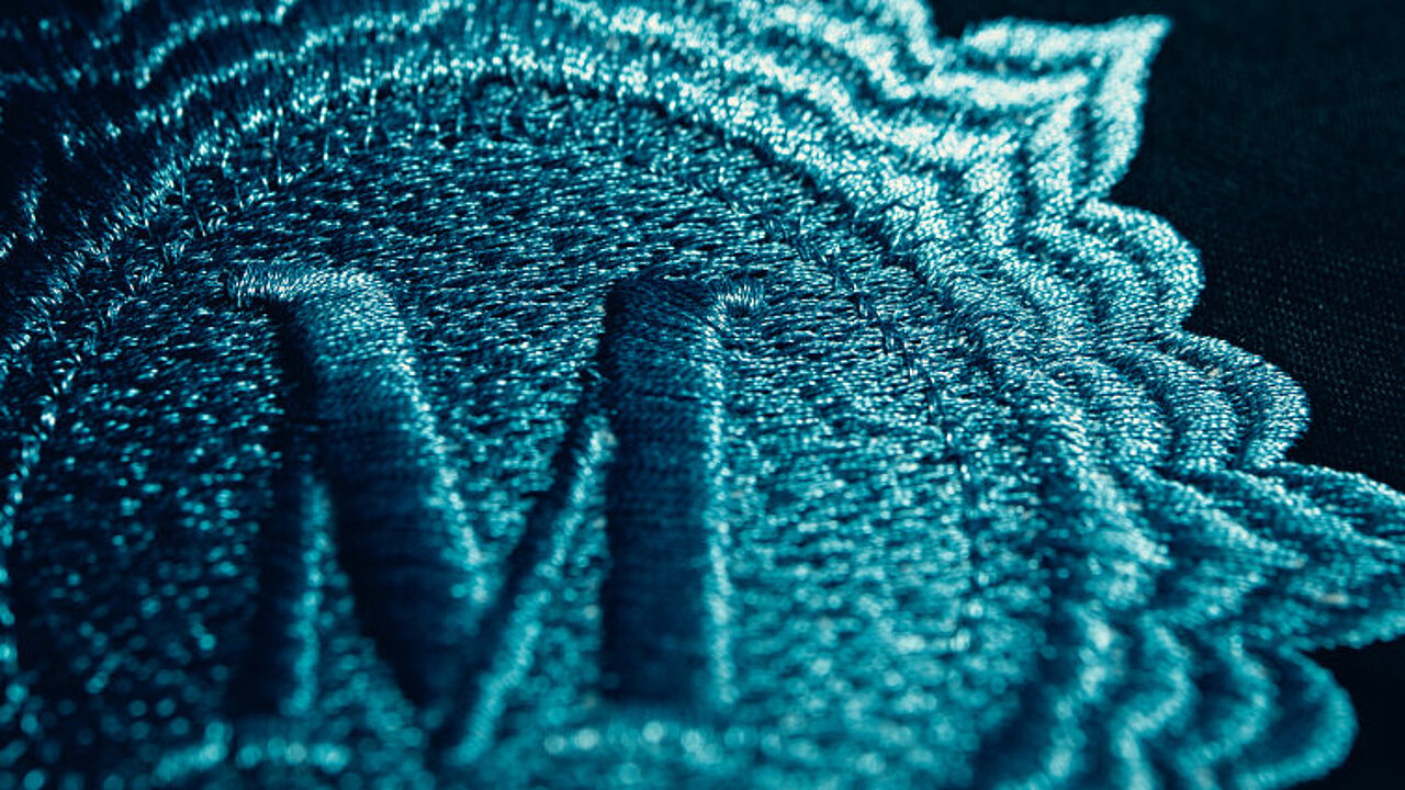 blue metallic embroidery design